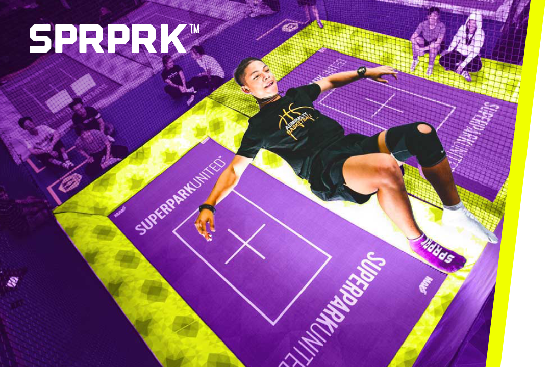 A young man bouncing on a trampoline with SPRPRK™ text