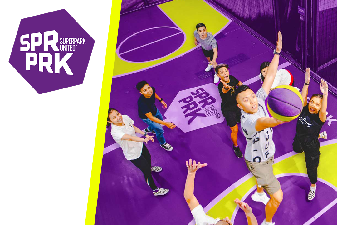 Young adults playing basketball, SuperPark logo in the corner